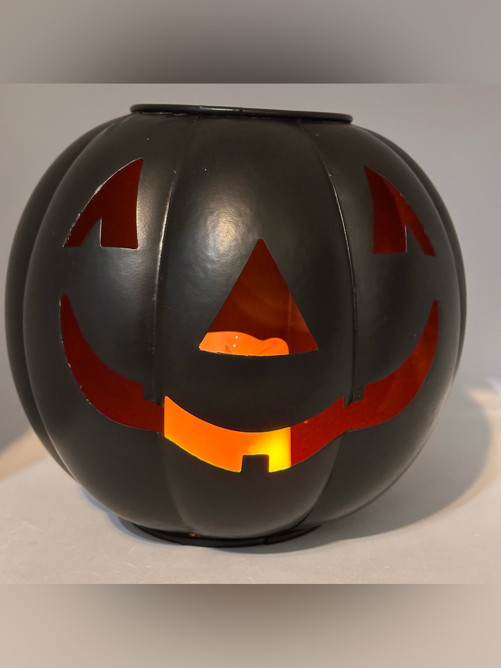 Black Metal Halloween Jack O' Lantern with LED Candle 7.5 Inch Tall x 8 In. Wide
